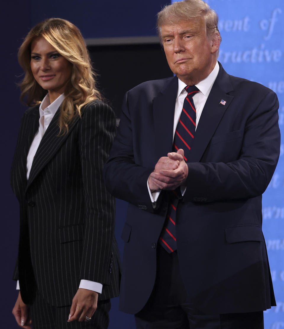 <p><a href="https://people.com/politics/president-donald-trump-first-lady-melania-test-positive-conoravirus/" rel="nofollow noopener" target="_blank" data-ylk="slk:President Trump and First Lady Melania announced their positive test results;elm:context_link;itc:0;sec:content-canvas" class="link ">President Trump and First Lady Melania announced their positive test results</a> on Twitter, just hours after it was confirmed the president's adviser <a href="https://people.com/health/trump-advisor-hope-hicks-tests-positive-for-coronavirus/" rel="nofollow noopener" target="_blank" data-ylk="slk:Hope Hicks;elm:context_link;itc:0;sec:content-canvas" class="link ">Hope Hicks</a> had contracted the contagious virus.</p> <p>"Tonight, @FLOTUS and I tested positive for COVID-19," President Trump <a href="https://twitter.com/realDonaldTrump/status/1311892190680014849" rel="nofollow noopener" target="_blank" data-ylk="slk:tweeted;elm:context_link;itc:0;sec:content-canvas" class="link ">tweeted</a> on Oct. 2. "We will begin our quarantine and recovery process immediately. We will get through this TOGETHER!"</p> <p>Mrs. Trump <a href="https://twitter.com/FLOTUS/status/1311900591174680581" rel="nofollow noopener" target="_blank" data-ylk="slk:tweeted minutes later;elm:context_link;itc:0;sec:content-canvas" class="link ">tweeted minutes later</a> that she and her husband were "feeling good."</p> <p>"As too many Americans have done this year, @potus & I are quarantining at home after testing positive for COVID-19," she wrote. "We are feeling good & I have postponed all upcoming engagements. Please be sure you are staying safe & we will all get through this together."</p> <p>After his announcement, <a href="https://people.com/politics/donald-trump-hospitalized-abundance-of-caution-walter-reed/" rel="nofollow noopener" target="_blank" data-ylk="slk:Trump was hospitalized;elm:context_link;itc:0;sec:content-canvas" class="link ">Trump was hospitalized</a> for three days at the Walter Reed National Military Medical Center and has <a href="https://people.com/politics/donald-trump-leaves-walter-reed-after-being-hospitalized-for-coronavirus/" rel="nofollow noopener" target="_blank" data-ylk="slk:since returned to the White House;elm:context_link;itc:0;sec:content-canvas" class="link ">since returned to the White House</a>.</p> <p>On Oct. 5, White House physician Dr. Sean Conley said that Trump would be able to continue his treatment from home at the White House.</p> <p>"<a href="https://people.com/health/drug-dexamethasone-trump-took-coronavirus-can-be-an-upper/" rel="nofollow noopener" target="_blank" data-ylk="slk:Though he may not be entirely out of the woods yet;elm:context_link;itc:0;sec:content-canvas" class="link ">Though he may not be entirely out of the woods yet</a>, the team and I agree that all our evaluations - and most importantly, his clinical status - support the president's safe return home," Conley said.</p> <p>Instead of remaining in isolation, Trump made another outing over the weekend to wave at his supporters outside Walter Reed from his presidential motorcade - a move that <a href="https://people.com/politics/trump-surprise-visit-outside-walter-reed-amid-hospitalization/" rel="nofollow noopener" target="_blank" data-ylk="slk:was criticized;elm:context_link;itc:0;sec:content-canvas" class="link ">was criticized</a> for putting others at risk of contracting the virus.</p> <p>Just before leaving Walter Reed, Trump sent out a tweet <a href="https://twitter.com/realDonaldTrump/status/1313243541959737349" rel="nofollow noopener" target="_blank" data-ylk="slk:promising to be back on the campaign trail "soon.";elm:context_link;itc:0;sec:content-canvas" class="link ">promising to be back on the campaign trail "soon."</a></p> <p>Since President Trump's positive diagnosis, at least half-a-dozen members of the administration (plus several non-officials who recently visited the White House and several journalists) <a href="https://people.com/politics/list-of-positive-white-house-coronavirus-cases/" rel="nofollow noopener" target="_blank" data-ylk="slk:have tested positive for the virus;elm:context_link;itc:0;sec:content-canvas" class="link ">have tested positive for the virus</a>, including Trump's campaign manager Bill Stepien, former senior aide <a href="https://people.com/politics/kellyanne-conway-tests-positive-for-coronavirus/" rel="nofollow noopener" target="_blank" data-ylk="slk:Kellyanne Conway;elm:context_link;itc:0;sec:content-canvas" class="link ">Kellyanne Conway</a>, former New Jersey Gov. <a href="https://people.com/politics/chris-christie-americans-have-to-accept-thousands-coronavirus-deaths-per-day/" rel="nofollow noopener" target="_blank" data-ylk="slk:Chris Christie,;elm:context_link;itc:0;sec:content-canvas" class="link ">Chris Christie,</a> <a href="https://people.com/politics/kayleigh-mcenany-test-positive-coronavirus/" rel="nofollow noopener" target="_blank" data-ylk="slk:Press Secretary Kayleigh McEnany;elm:context_link;itc:0;sec:content-canvas" class="link ">Press Secretary Kayleigh McEnany</a>, assistant to the president Nicholas Luna and assistant press secretaries Karoline Leavitt and Chad Gilmartin.</p>