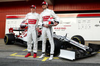 FILE PHOTO: Formula One F1 - Pre Season Testing - Circuit de Barcelona-Catalunya, Barcelona, Spain - February 18, 2019 Alfa Romeo's Kimi Raikkonen and Antonio Giovinazzi pose with the car before testing REUTERS/Albert Gea