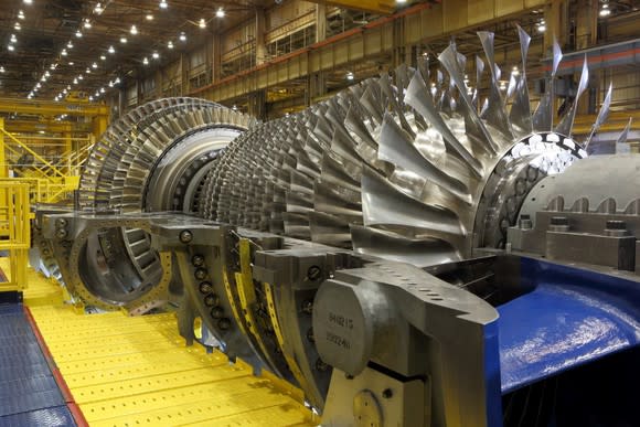 A gas turbine being built in a factory