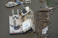 A building is flooded Thursday, Aug. 27, 2020, after Hurricane Laura went through the area near Lake Charles, La. (AP Photo/David J. Phillip)