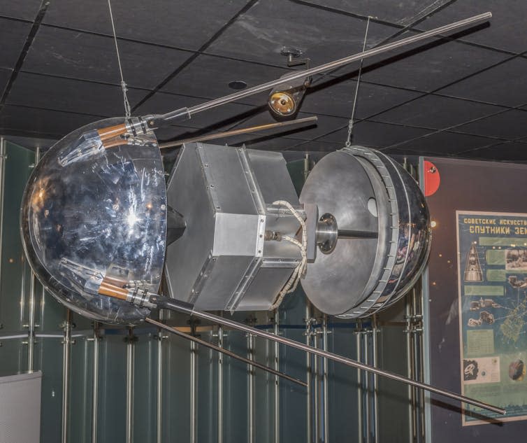 The Sputnik satellite is exhibited in a museum.