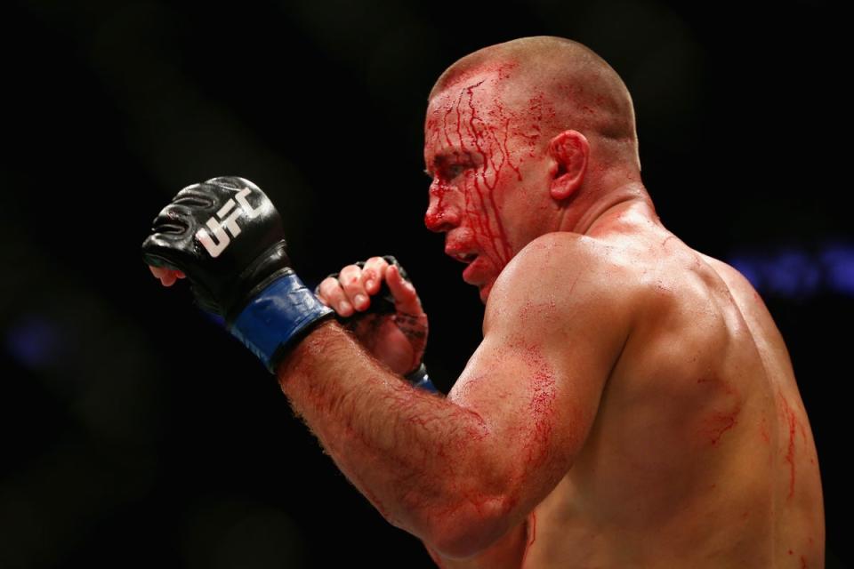 Georges St-Pierre reigned as welterweight champion and later won the middleweight belt (Getty Images)