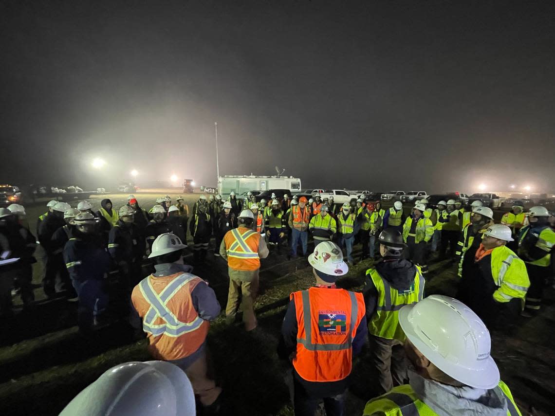 Oil spill cleanup crews from pipeline operator TC Energy gather at their morning briefing on Saturday, Dec. 10, 2022, in Washington County, Kansas.