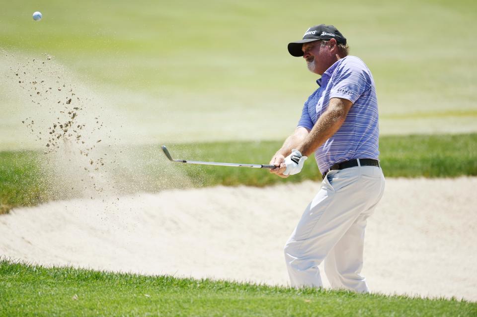 Jerry Kelly hits from a green-side sand trap on the fifth hole during the second round of the 2021 American Family Insurance Championship at University Ridge Golf Course in Madison.