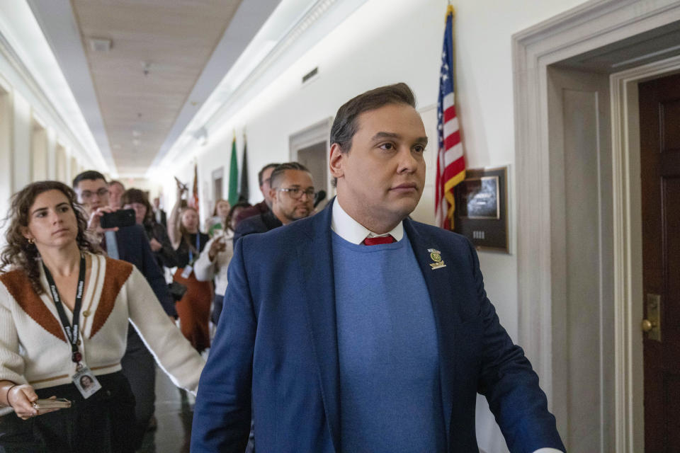 Rep. George Santos, R-N.Y., departs a House Republican closed-door caucus to decide who to nominate for speaker of the House, on Capitol Hill, Wednesday, Oct. 11, 2023, in Washington. (AP Photo/Alex Brandon)