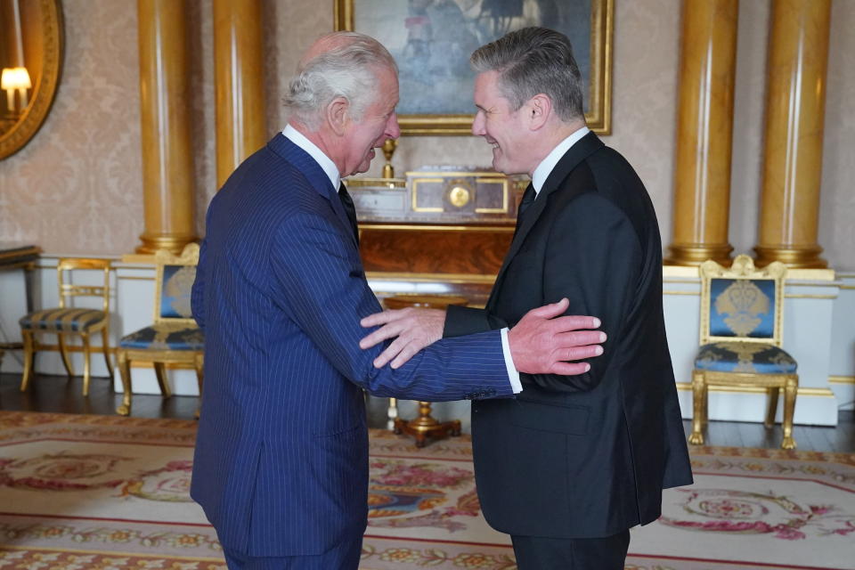 FILE - King Charles III greets Labour leader Sir Keir Starmer, during an audience in the 1844 Room, at Buckingham Palace, London, Saturday, Sept. 10, 2022. (Jonathan Brady/Pool Photo via AP, File)