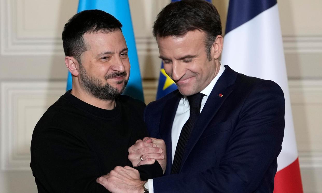 <span>Ukrainian president, Volodymyr Zelenskiy, and French president, Emmanuel Macron, shake hands at a press conference earlier this month.</span><span>Photograph: Thibault Camus/AP</span>