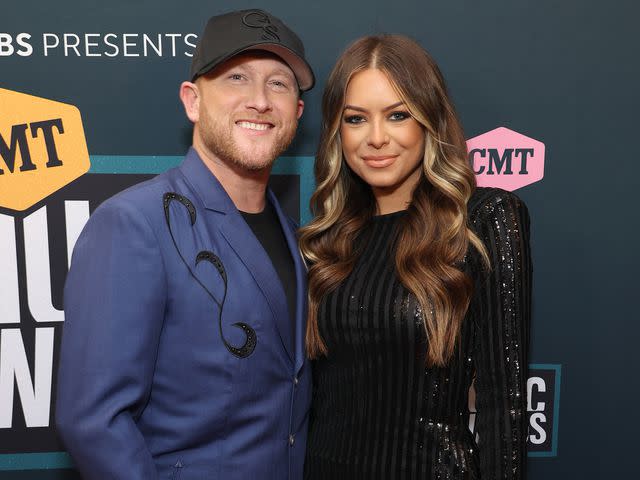 <p>Jason Kempin/Getty</p> Cole Swindell and Courtney Little at the 2022 CMT Music Awards in Nashville, Tennessee.