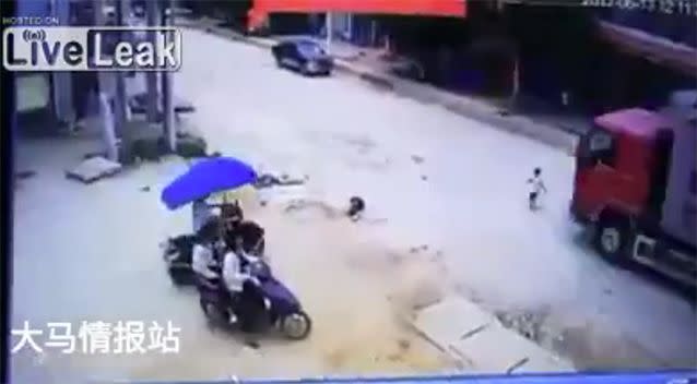 The little boy came face to face with the big truck. Source: LiveLeak