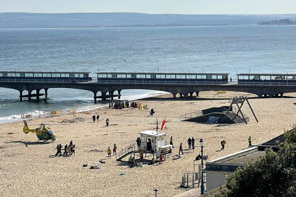 Emergency services at the scene on Wednesday  (PA)