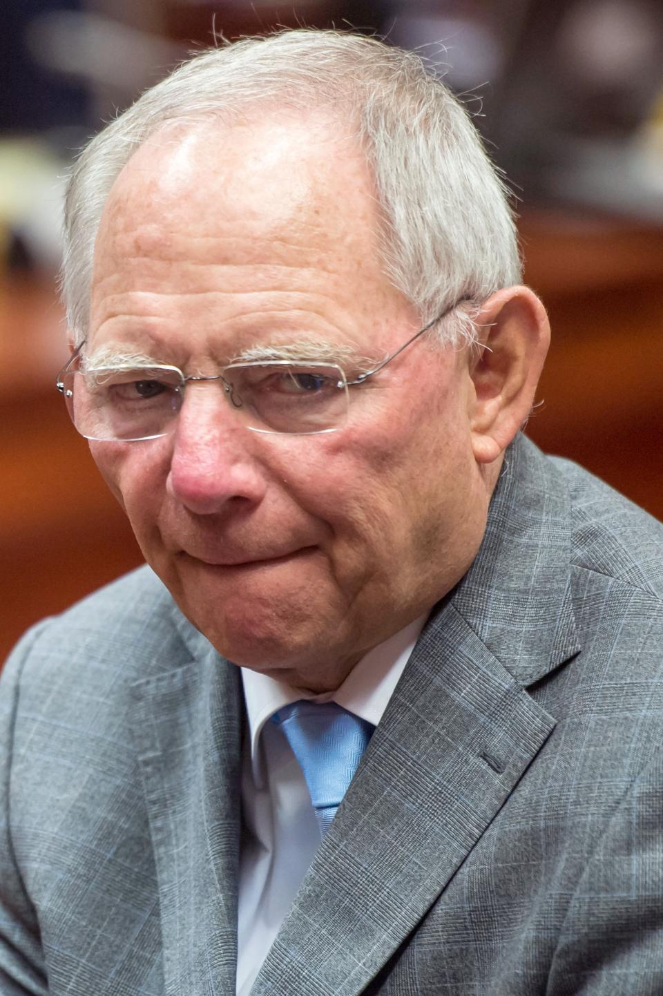 Germany's Finance Minister Wolfgang Schaeuble arrives for a meeting of EU finance ministers at the European Council building in Brussels, Tuesday, May 6, 2014. (AP Photo/Geert Vanden Wijngaert)