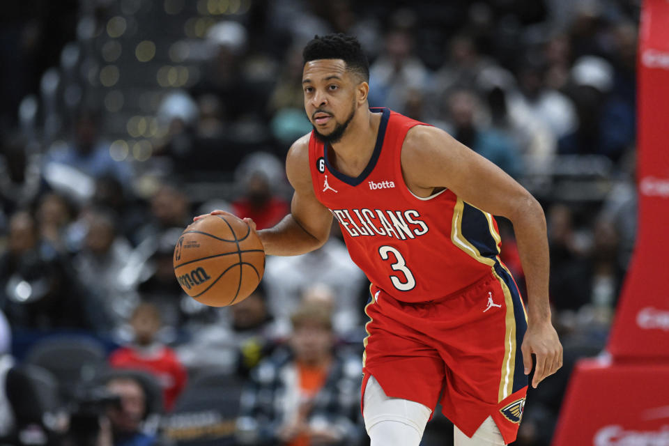 New Orleans Pelicans guard CJ McCollum (3) brings the ball upcourt during the first quarter of an NBA basketball game against the Washington Wizards, Monday, Jan. 9, 2023, in Washington. (AP Photo/Terrance Williams)