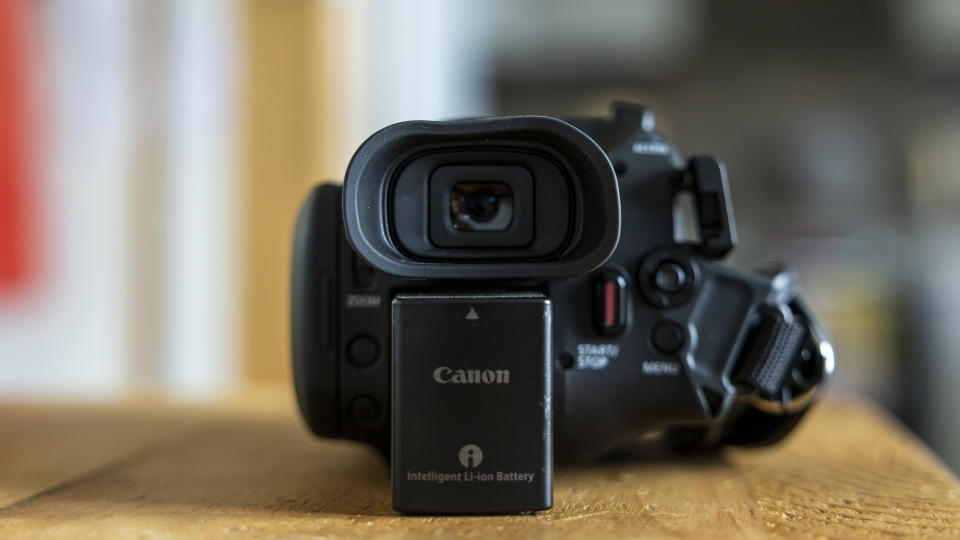 The Canon HF G70 on a wooden table