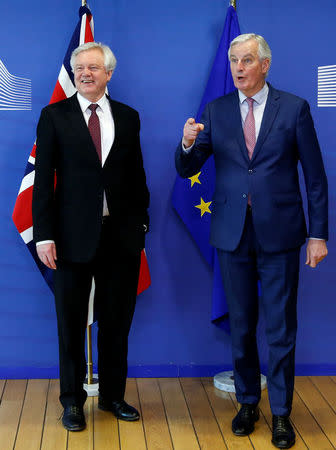 Britain's Secretary of State for Exiting the European Union David Davis and European Union's chief Brexit negotiator Michel Barnier pose ahead of a meeting in Brussels, Belgium, March 19, 2018. REUTERS/Francois Lenoir