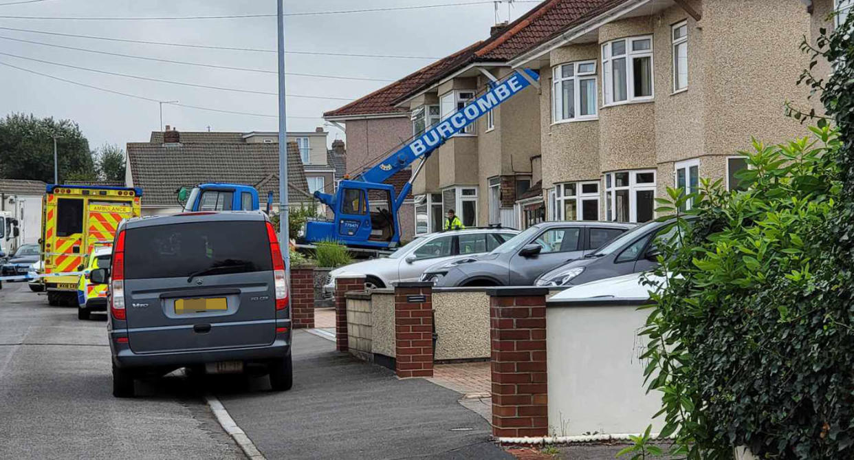 A crane on Springleaze in Mangotsfield, Bristol, where a man in his 70s was killed after being hit by a heavy load. (BPM Media)