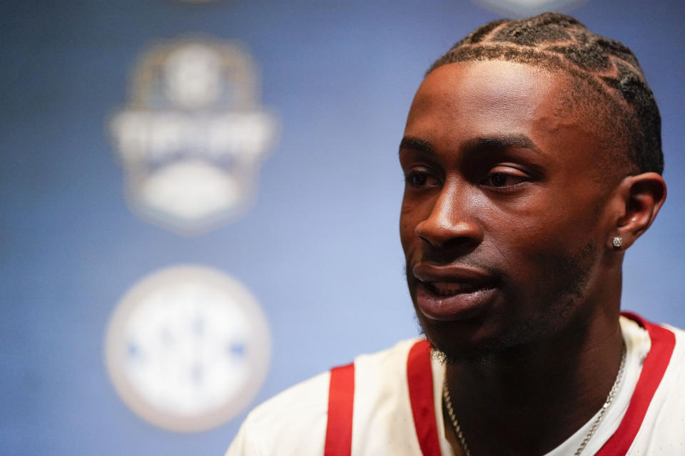 Arkansas NCAA college basketball player Davonte Davis speaks during Southeastern Conference Media Days, Wednesday, Oct. 18, 2023, in Birmingham, Ala. (AP Photo/Mike Stewart)