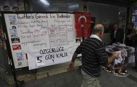 A board shows alternative ways to access Twitter, is placed at an election campaign office of the main opposition Republican's People's Party (CHP) in Istanbul March 25, 2014. REUTERS/Murad Sezer