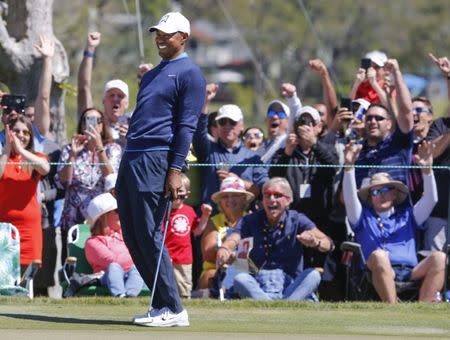 Mar 15, 2018; Orlando, FL, USA; Tiger Woods reacts to making a long putt on the seventh green during the first round of the Arnold Palmer Invitational golf tournament at Bay Hill Club & Lodge . Mandatory Credit: Reinhold Matay-USA TODAY Sports