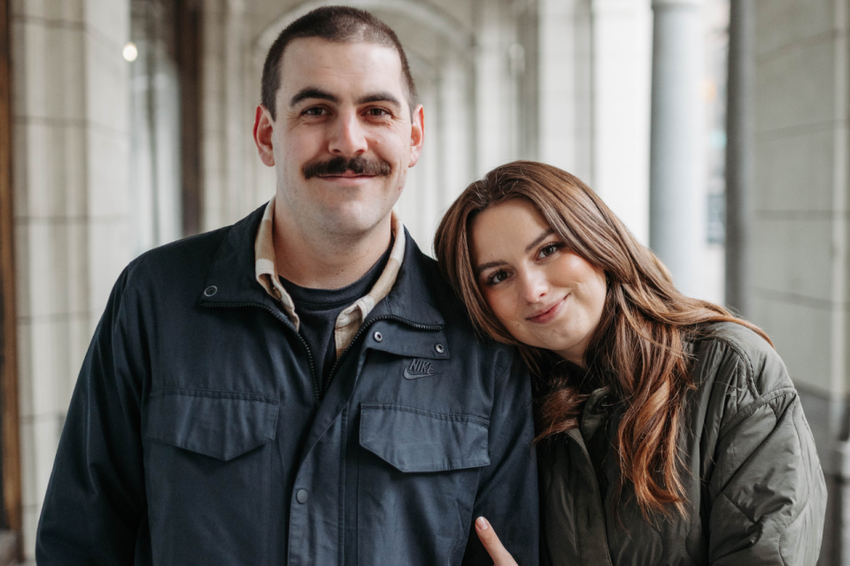 Geoff Boc and his girlfriend, Lauren Anderson. The Calgary couple are raising money for Boc, who was diagnosed with brain cancer in 2022, o travel to the U.S. for clinical trials. (Image supplied by Lauren Anderson. Photography by Emily Walcot)