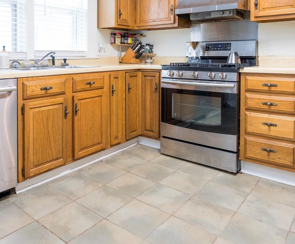The kitchen has an ample amount of space for food storage and food preparation.