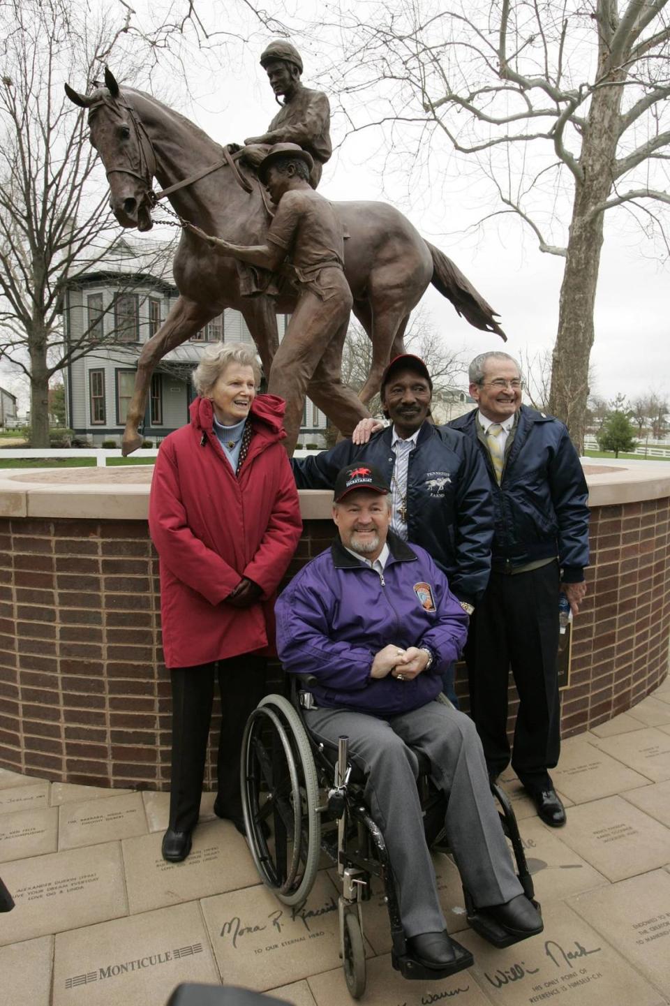 Secretariat’s owner, Penny Chenery, left, posed with the Secretariat team of jockey Ron Turcotte, seated, and exercise riders Charlie Davis and Jim Gaffney, right, at the dedication of a bronze statue of the horse at the Kentucky Horse Park in 2006.