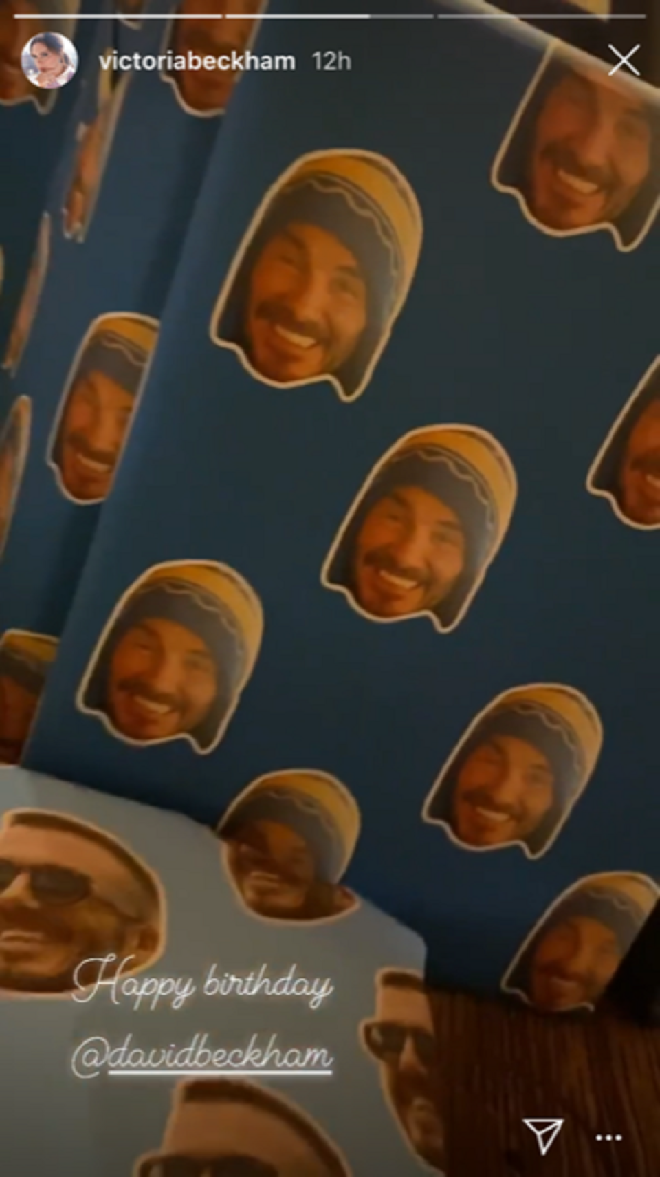 The wrapping paper featuring David Beckham’s face (Victoria Beckham/Instagram Stories)