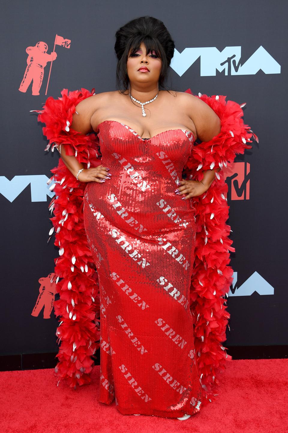 <h1 class="title">Lizzo in Moschino</h1><cite class="credit">Photo: Getty Images</cite>