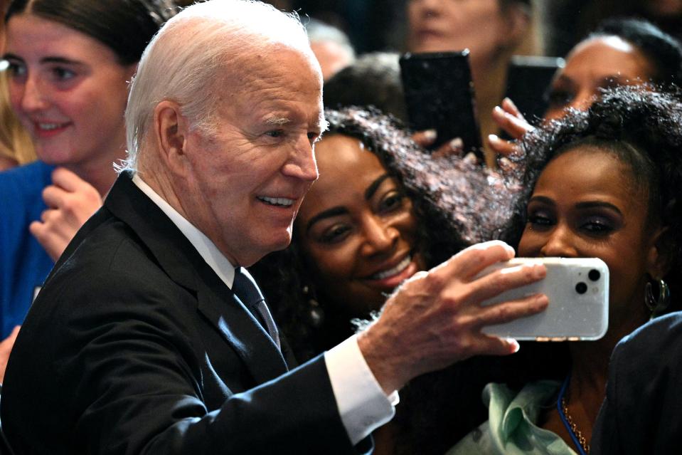 US President Joe Biden takes pictures with supporters as he visits a Biden-Harris campaign debate watch party in Atlanta, Georgia, on June 27, 2024, after President Biden debated former US President and Republican Presidential candidate Donald Trump. (Photo by Mandel NGAN / AFP) (Photo by MANDEL NGAN/AFP via Getty Images)