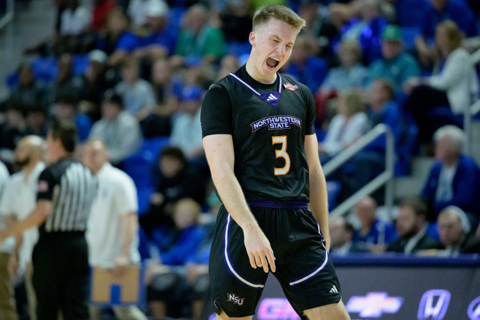 Northwestern State guard Isaac Haney (3) celebrates a three point basket against Texas A&M Corpus Christi during the first half an NCAA college basketball game in the finals of the Southland Conference men's tournament in Lake Charles, La., Wednesday, March 8, 2023. (AP Photo/Matthew Hinton)