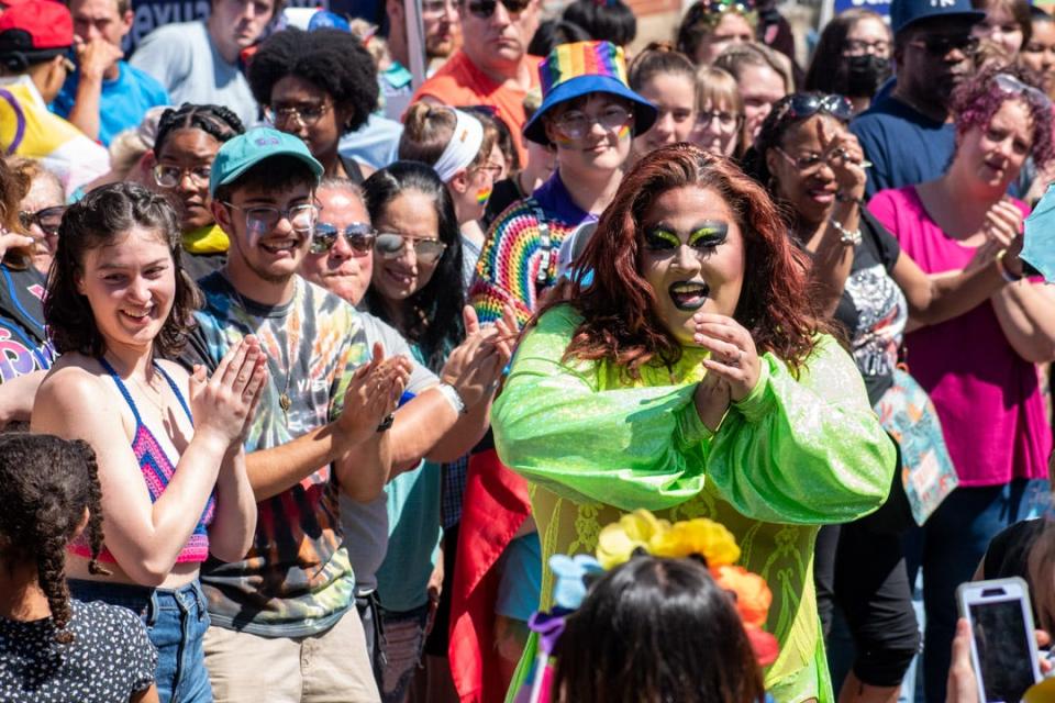 Crowd members applaud as drag queen Krymson Scholar performs at Pocono Pride Festival in Stroudsburg on Sunday, June 5, 2022.