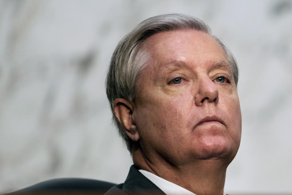 Sen. Lindsey Graham, R-S.C., listens during a confirmation hearing for Supreme Court nominee Amy Coney Barrett before the Senate Judiciary Committee, Monday, Oct. 12, 2020, on Capitol Hill in Washington. (Erin Schaff/The New York Times via AP, Pool)