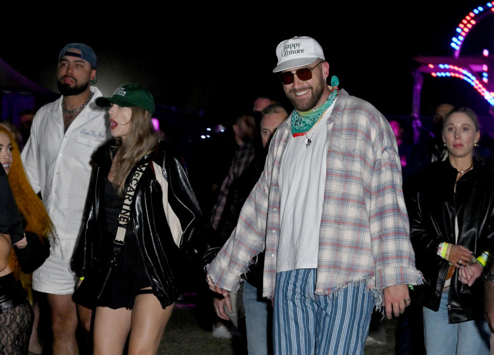 Taylor Swift and Travis Kelce at Neon Carnival held during the Coachella Music and Arts Festival on April 13, 2024 in Thermal, California. (Photo by Gilbert Flores/WWD via Getty Images)