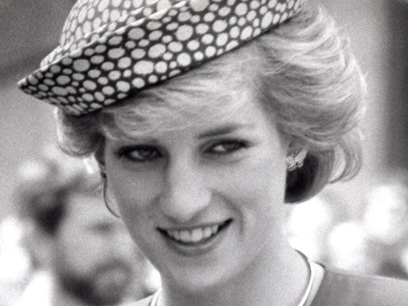 Princess Diana wearing butterfly earrings.