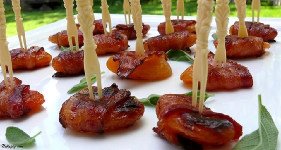 <p>Noble Pig</p><p>Dried apricots wrapped in juicy bacon and a sage leaf to complement.</p><p><strong>Get the recipe: <a href="https://noblepig.com/2010/04/baconwrapped-apricots-with-sage/" rel="nofollow noopener" target="_blank" data-ylk="slk:Bacon Wrapped Apricots with Sage;elm:context_link;itc:0;sec:content-canvas" class="link ">Bacon Wrapped Apricots with Sage</a></strong></p>