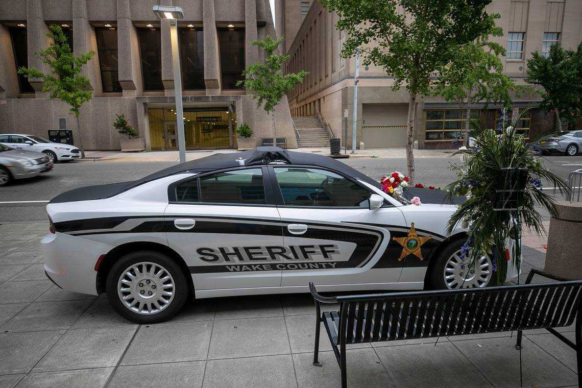 A memorial to slain Wake County Sheriffs Deputy Ned Byrd outside the Wake County Sheriffs office on Salisbury Street on Monday, August 15, 2022 in Raleigh, N.C. Deputy Byrd was found shot next to his patrol car on Thursday night August 11, 2022.