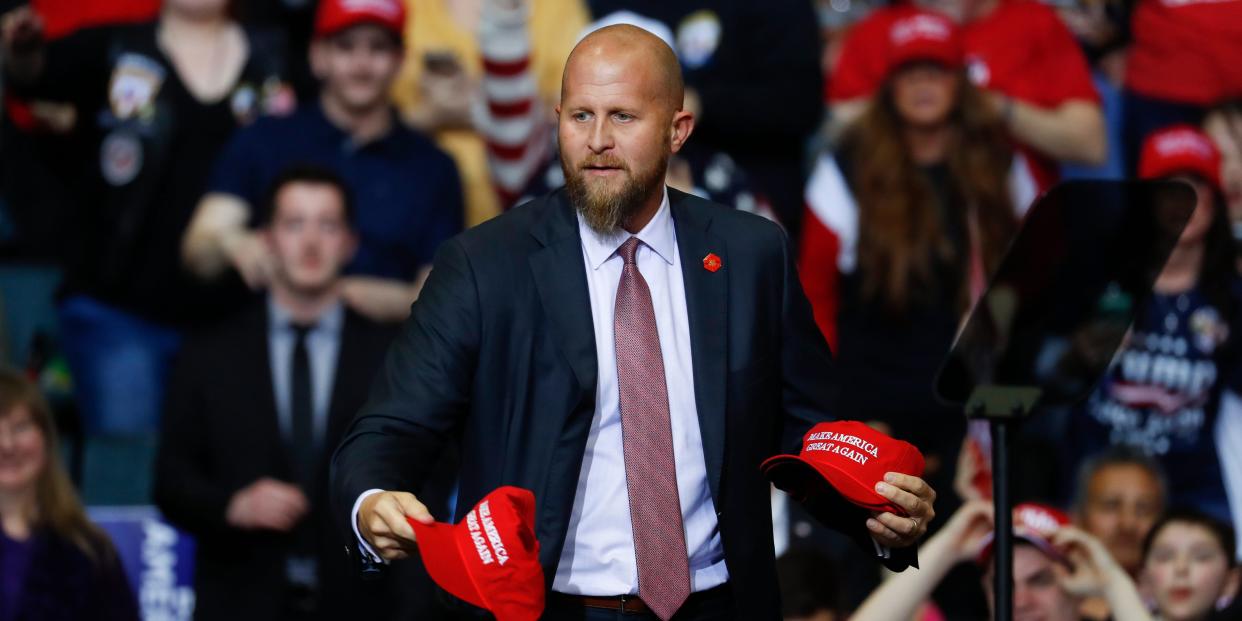 FILE - In this Thursday, March 28, 2019, file photo, Brad Parscale, manager of President Donald Trump's reelection campaign, throws "Make America Great Again," hats to the audience before a rally in Grand Rapids, Mich. Trump is shaking up his campaign amid sinking poll numbers, replacing Parscale with veteran GOP operative Bill Stepien. Trump and Parscale’s relationship had been strained since a Tulsa, Okla., rally that drew a dismal crowd, infuriating the president. (AP Photo/Paul Sancya, File)