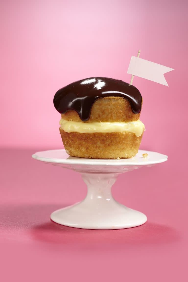 <p><strong>Then: </strong>Our 1950s recipe left out the signature chocolate sauce. WD used instant pudding as the filling in the first version. The original called for a store-bought whole sponge cake as a base.</p><p><strong>Now: </strong>Must. Have. Chocolate. We used bittersweet for a decadent hit. Our easy, from-scratch pudding is smooth, silky and full of pure vanilla flavor. We turned the cake into individual, fresh-baked treats.</p><p><a rel="nofollow noopener" href="http://www.womansday.com/food-recipes/food-drinks/recipes/a12899/boston-cream-cupcakes-recipe-wdy0514/" target="_blank" data-ylk="slk:Get the recipe.;elm:context_link;itc:0;sec:content-canvas" class="link "><strong>Get the recipe.</strong></a> </p>