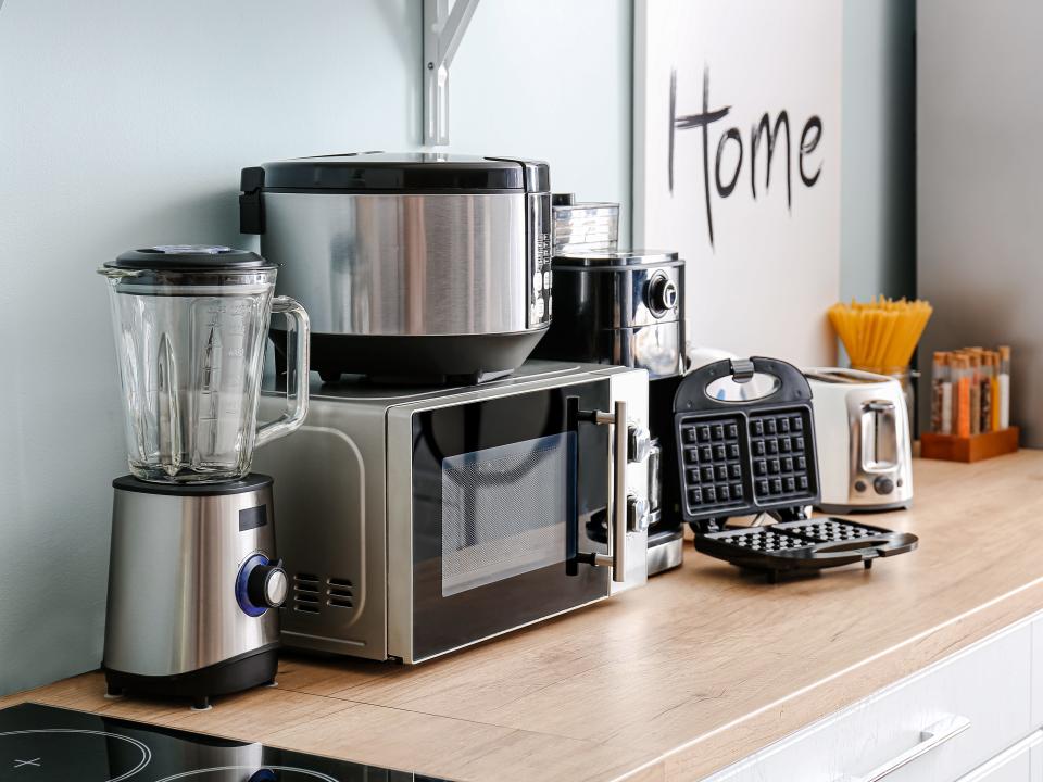 Uncovered kitchen appliances on counter