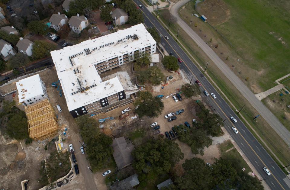 A 2019 drone photo shows StoryBuilt's mixed-use project at 900 South First St., across from the Texas School for the Deaf. StoryBuilt has furloughed much of its staff over the past couple of weeks.