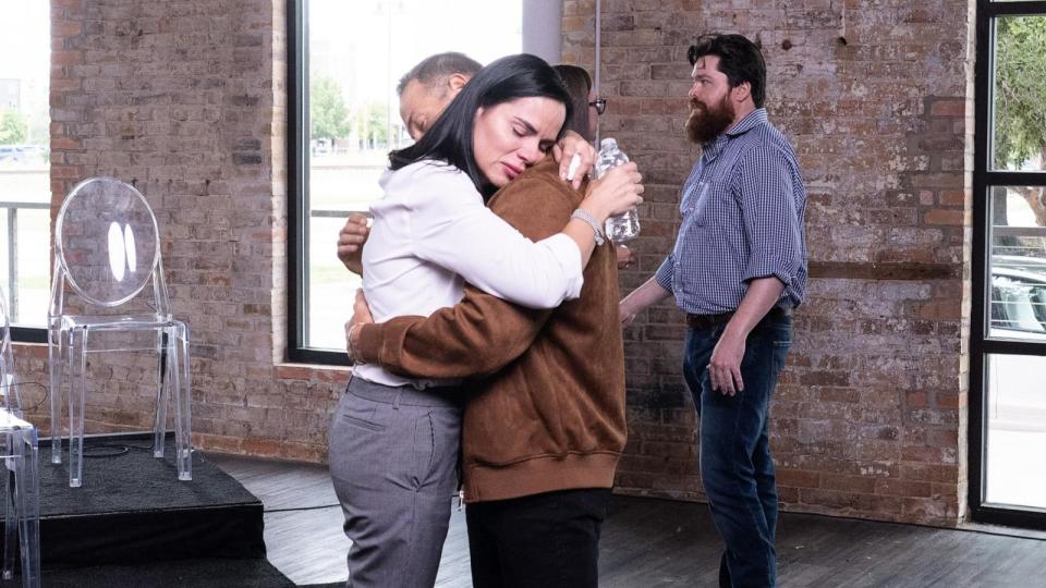 PHOTO: Anabely Lopes and her husband embrace after 18 women sit down with Diane Sawyer and Rachel Scott for an emotional interview. (Brandon Thibodeaux for ABC News)