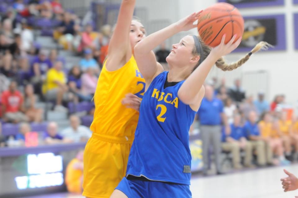 Salina Central's Aubrie Kierscht (2) puts up a shot while being defended by Hoisington's Macy Hanzlick (22) during the KBCA All-Star Game Saturday, June 18, 2022 at Mabee Arena in Salina.