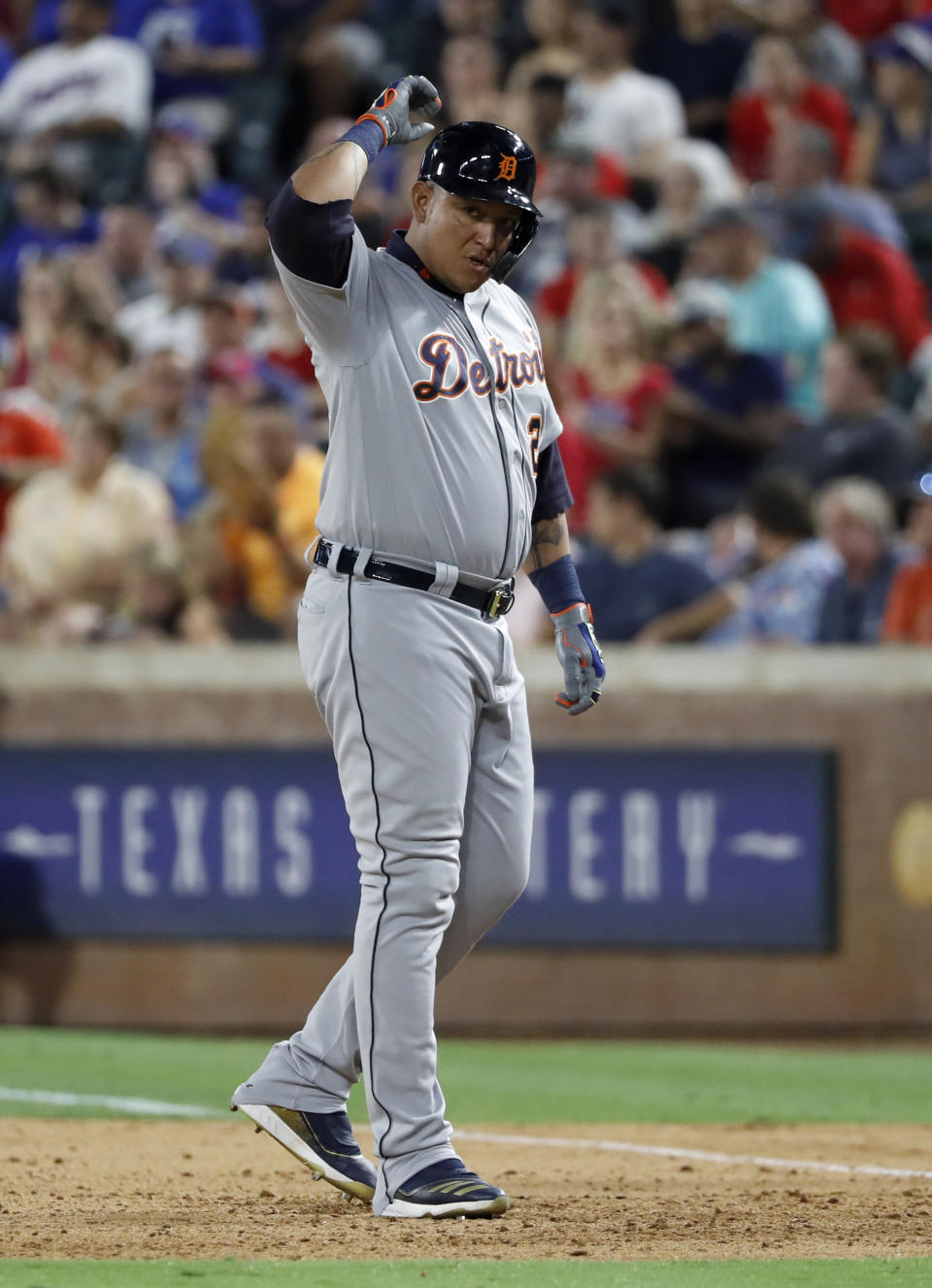 Detroit Tigers' Miguel Cabrera signals to the dugout after hitting an RBI single off Texas Rangers relief pitcher Jesse Chavez during the eighth inning of a baseball game in Arlington, Texas, Friday, Aug. 2, 2019. (AP Photo/Tony Gutierrez)