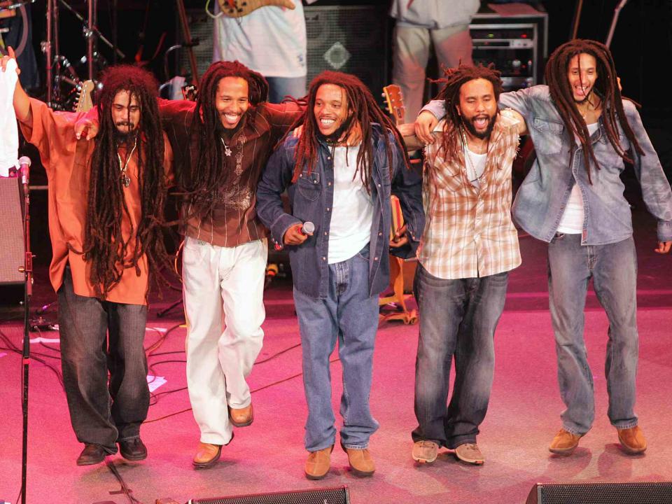 Frank Micelotta/Getty Damian, Ziggy, Stephen, Kymani and Julian Marley, sons of Bob Marley, perform onstage at the "Roots, Rock, Reggae Tour 2004" at the Filene Center August 8, 2004 in Vienna, Virginia