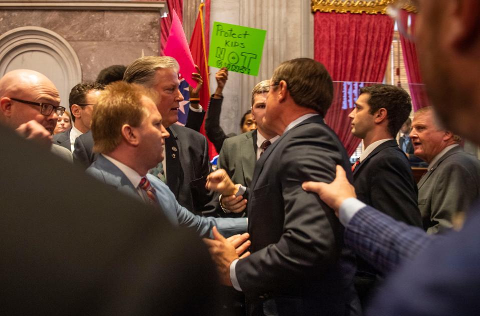 House members hold back Speaker Cameron Sexton as tempers flare as tempers flare on the House floor following the special legislative session on public safety in Nashville, Tenn., on Tuesday, August 29, 2023.