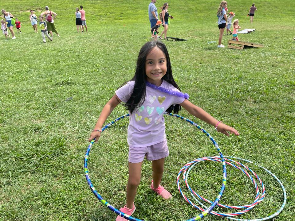 Dawn Deri is a hoop champ at the annual Hardin Valley Elementary School Popsicle Party on Sunday, Aug. 14, 2022.