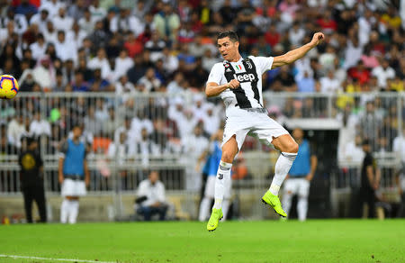 Soccer Football - Italian Super Cup - Juventus v AC Milan - King Abdullah Sports City, Jeddah, Saudi Arabia - January 16, 2019 Juventus' Cristiano Ronaldo scores their first goal REUTERS/Waleed Ali