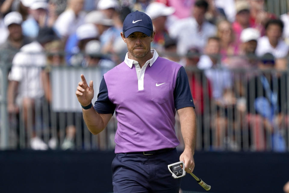 Rory McIlroy, of Northern Ireland, acknowledges the gallery after making his putt on the 18th green during the third round of the U.S. Open Golf Championship, Saturday, June 19, 2021, at Torrey Pines Golf Course in San Diego. (AP Photo/Marcio Jose Sanchez)