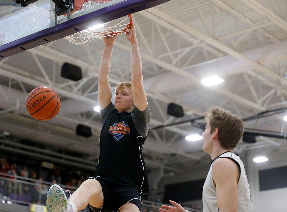 North All-Star's Baden Forup dunks against the South All-Stars during the News Journal All-Star Classic basketball game Friday, March 24, 2023 at Lexington High School. TOM E. PUSKAR/NEWS JOURNAL