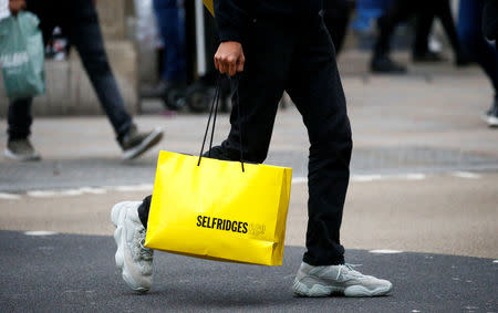 FILE PHOTO: People shopping on Oxford Street in central London, Britain, December 20, 2018. REUTERS/Henry Nicholls