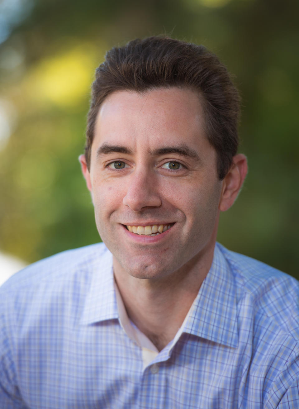 Smiling headshot of  Adam Shulman from Bose Professional.